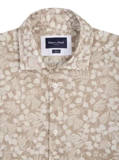 Chemise en coton beige avec des motifs floraux à coupe droite