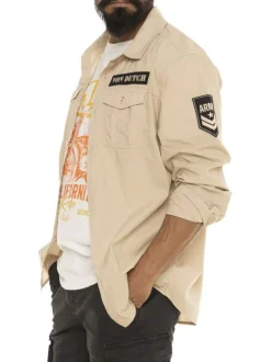 Chemise en coton beige avec un imprimé une coupe droite et un col à revers