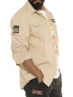 Chemise en coton beige avec un imprimé une coupe droite et un col à revers