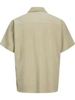 Chemise en coton beige à coupe droite pourvue d'un col cubain