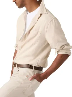 Chemise en coton beige à coupe droite pourvue d'un col à revers