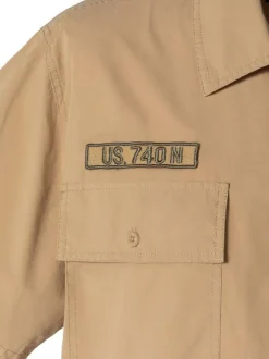 Chemise en coton beige à coupe droite pourvue d'un col à revers