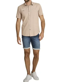 Chemise en coton beige à coupe droite pourvue d'un col à revers