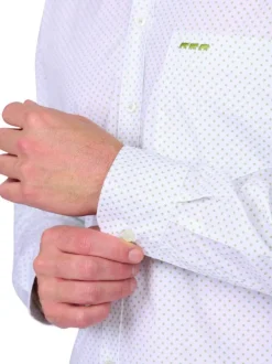 Chemise en coton biologique blanche à pois avec une coupe droite