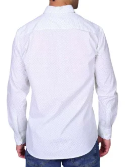 Chemise en coton biologique blanche à pois avec une coupe droite