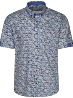 Chemise en coton blanche avec un imprimé en forme de rond bleu, beige et rouge