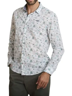 Chemise en coton blanche à coupe droite ornée d'un motif végétal