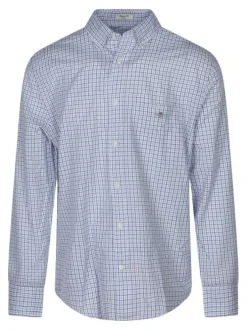 Chemise en coton blanche et bleue à carreaux avec un col boutonné