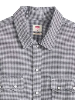 Chemise en coton blanche et noire unie avec une coupe droite et un col à revers