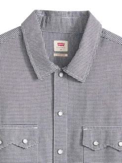 Chemise en coton blanche et noire unie avec une coupe droite et un col à revers