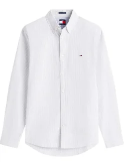 Chemise en coton blanche à rayures avec une coupe droite et col à revers