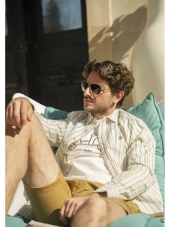 Chemise en coton blanche à rayures pourvue d'un col français