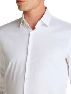 Chemise en coton blanche unie avec une coupe ajustée et le logo brodé en petit