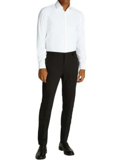 Chemise en coton blanche unie avec une coupe ajustée et les boutons cachés