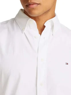 Chemise en coton blanche unie avec une coupe droite et un col américain