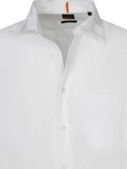 Chemise en coton blanche unie avec une coupe droite et un col français