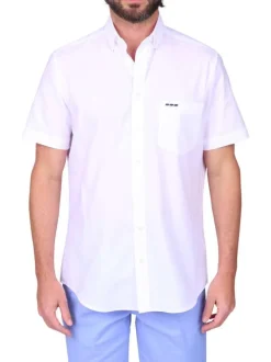 Chemise en coton blanche unie avec une coupe droite et un col à revers