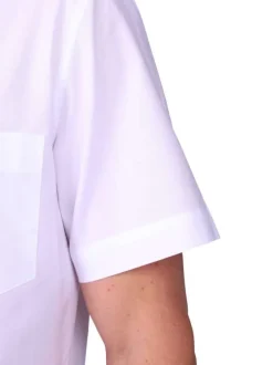 Chemise en coton blanche unie avec une coupe droite et un col à revers