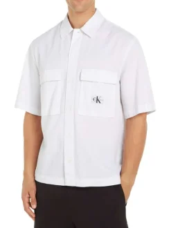 Chemise en coton blanche unie avec une coupe relaxed et un col français