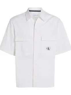 Chemise en coton blanche unie avec une coupe relaxed et un col français