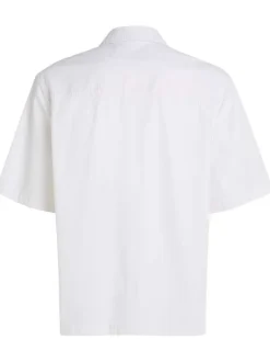 Chemise en coton blanche unie avec une coupe relaxed et un col français