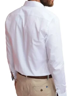 Chemise en coton blanche unie avec une coupe slim fit et des manches à pression