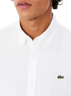 Chemise en coton blanche unie à coupe droite avec un col américain