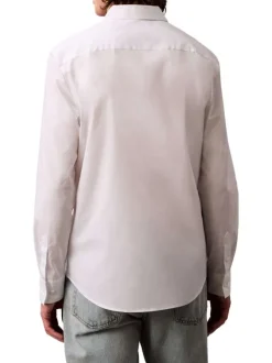 Chemise en coton blanche unie à coupe regular fit fermée par des boutons