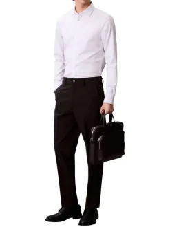 Chemise en coton blanche unie à coupe slim avec des manches boutonnées