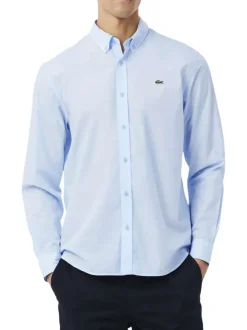 Chemise en coton bleu clair à coupe droite pourvue d'un col à revers