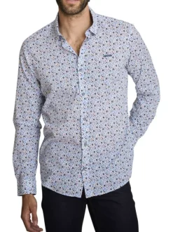 Chemise en coton bleu à coupe droite ornée d'un motif floral tricolore