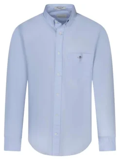 Chemise en coton bleue ciel unie à col américain avec une poche plaquée