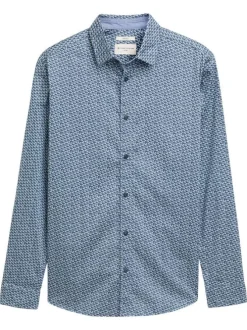 Chemise en coton bleue à petits imprimés avec une coupe ajustée