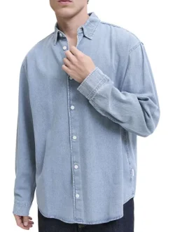 Chemise en coton bleue unie à coupe droite pourvue d'un col à revers