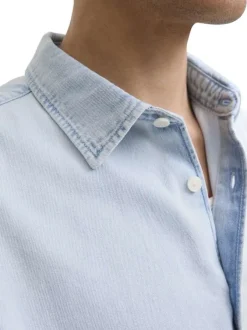 Chemise en coton bleue unie à coupe droite pourvue d'un col à revers