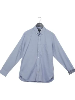 Chemise en coton bleue unie coupe regular fit avec un col boutonné