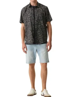 Chemise en coton bleu marine à imprimé floral avec une coupe droite