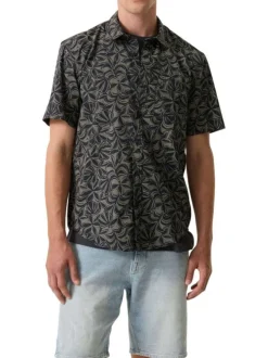 Chemise en coton bleu marine à imprimé floral avec une coupe droite