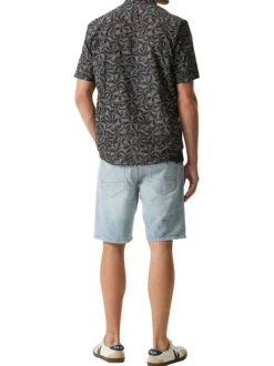 Chemise en coton bleu marine à imprimé floral avec une coupe droite