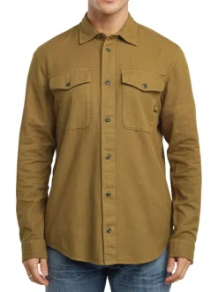 Chemise en coton brun unie avec une coupe droite et des poches