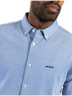 Chemise en coton ciel chinée avec une coupe droite et un col américain