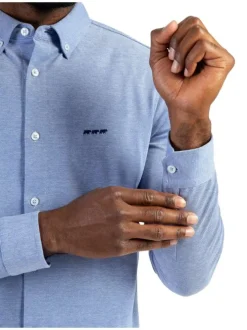 Chemise en coton ciel chinée avec une coupe droite et un col américain