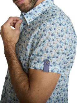Chemise en coton ciel à coupe droite ornée d'un motif floral tricolore