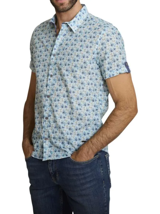 Chemise en coton ciel à coupe droite ornée d'un motif floral tricolore
