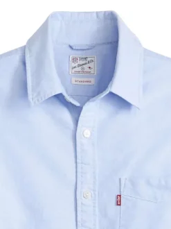 Chemise en coton ciel à coupe droite pourvue d'un col à revers