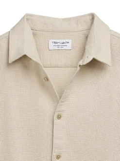 Chemise en coton écrue en maille à coupe regular fit et à manches boutonnées