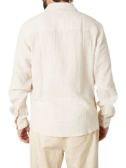 Chemise en coton écrue unie pourvue d'une coupe droite et d'un col français