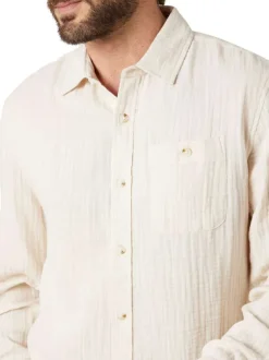 Chemise en coton écrue unie pourvue d'une coupe droite et d'un col français