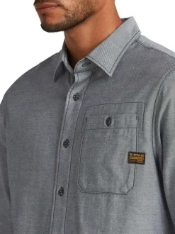 Chemise en coton grise unie avec une coupe droite et des boutons