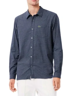 Chemise en coton marine à carreaux avec un col à rabats et des manches longues
